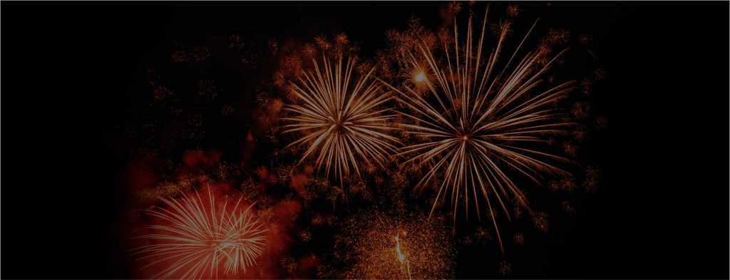Red fireworks bursting in the Oklahoma sky