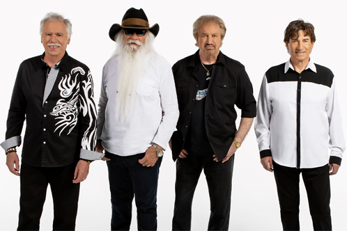 The Oak Ridge Boys band standing against a white background